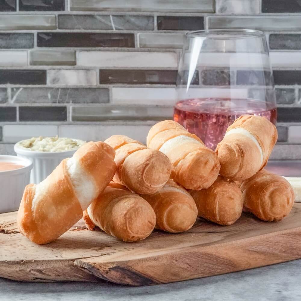 
                  
                    Tequeños con Queso - Fried Rolled Wheat Dough Stuffed with Cheese
                  
                